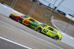 2025 Cup New Hampshire side-by-side racing III - Team Penske teammates Joey Logano, No. 22 Ford, and Ryan Blaney, No. 12 Ford (Credit: Chase Folsom)