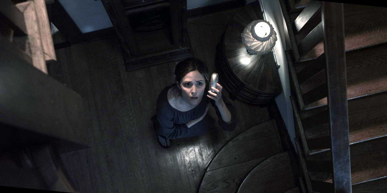 Renai listens to the baby monitor in Insidious 