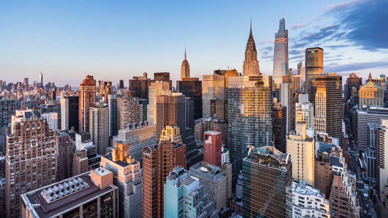 New York City skyline with Chrysler Building, Empire State Building, and World Trade Center in background