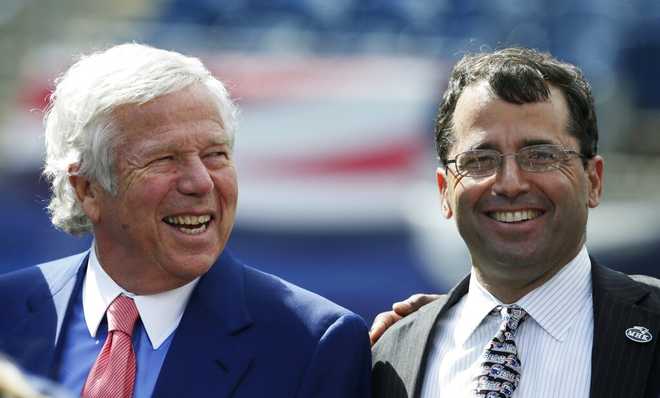 New England Patriots owner Robert Kraft with his son Josh Kraft in Foxborough, Mass., Wednesday June 12, 2013. (AP Photo/Charles Krupa)