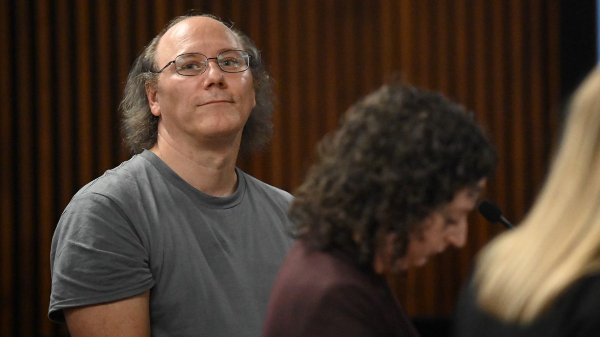 Lorenz F. Kraus appears to smile in court