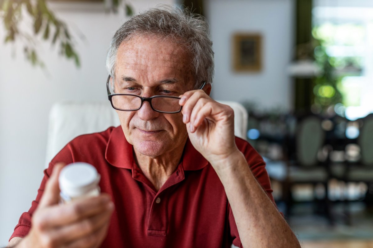 Man taking painkiller.