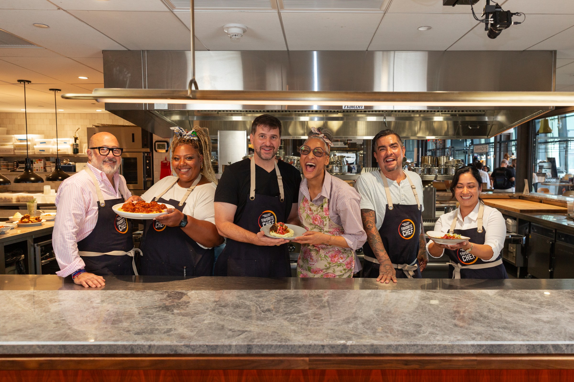 Andrew Zimmern with Zimmern, meanwhile, chose Camille Napolitano McDowell from Los Angeles; Carla Hall’s pick was Tuscon’s Christian Padilla; while Aarón Sánchez picked Shawnny Roman from Scottsdale.