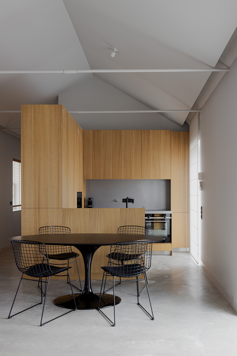 renovated porto residence reimagines hillside terraces with stepped concrete layers