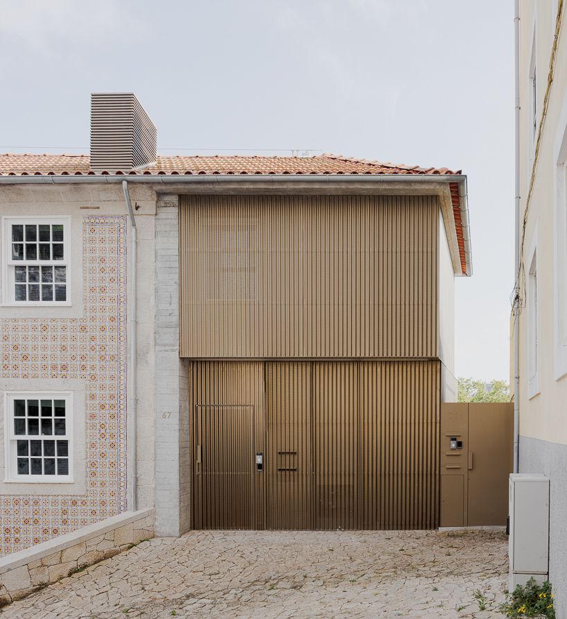 renovated porto residence reimagines hillside terraces with stepped concrete layers