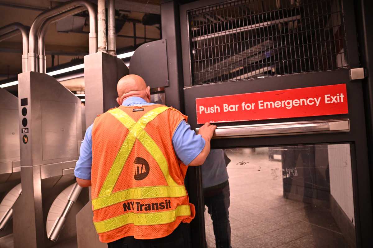 A closer look at how gate guards deter fare evasion in NYC subways