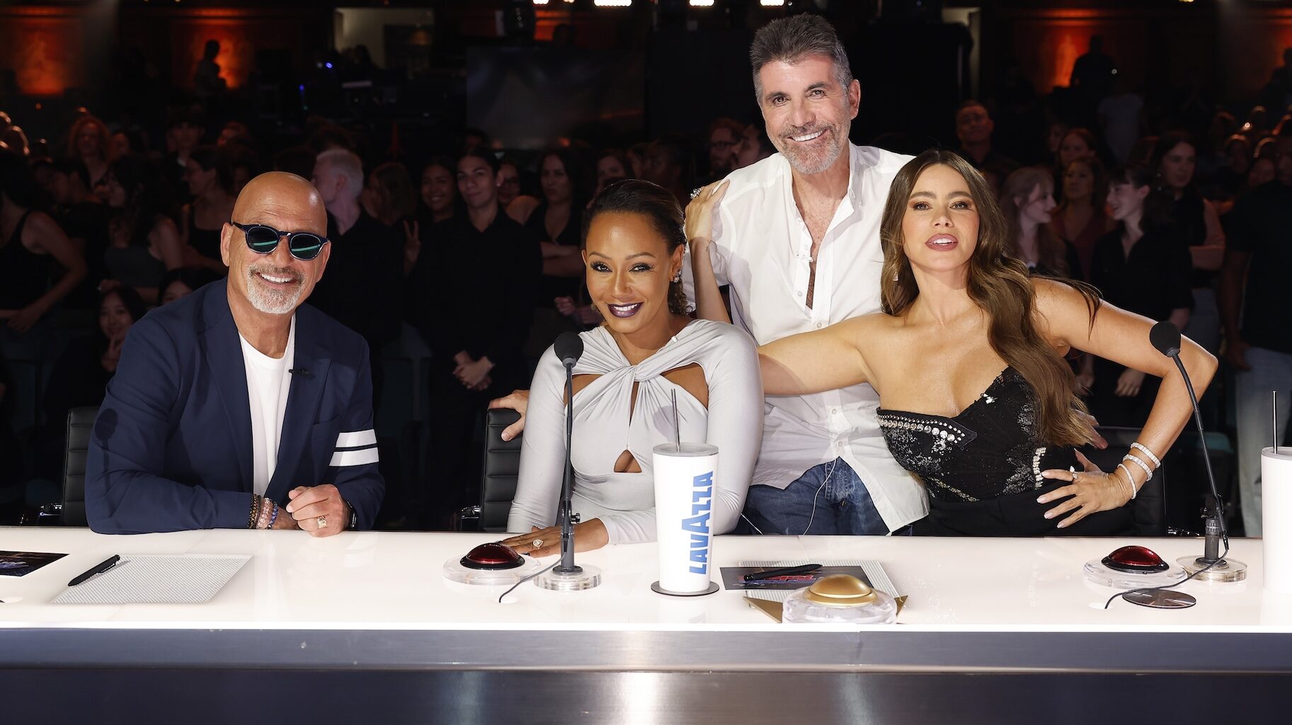 The Judges smile and pose together on AGT Episode 2015.