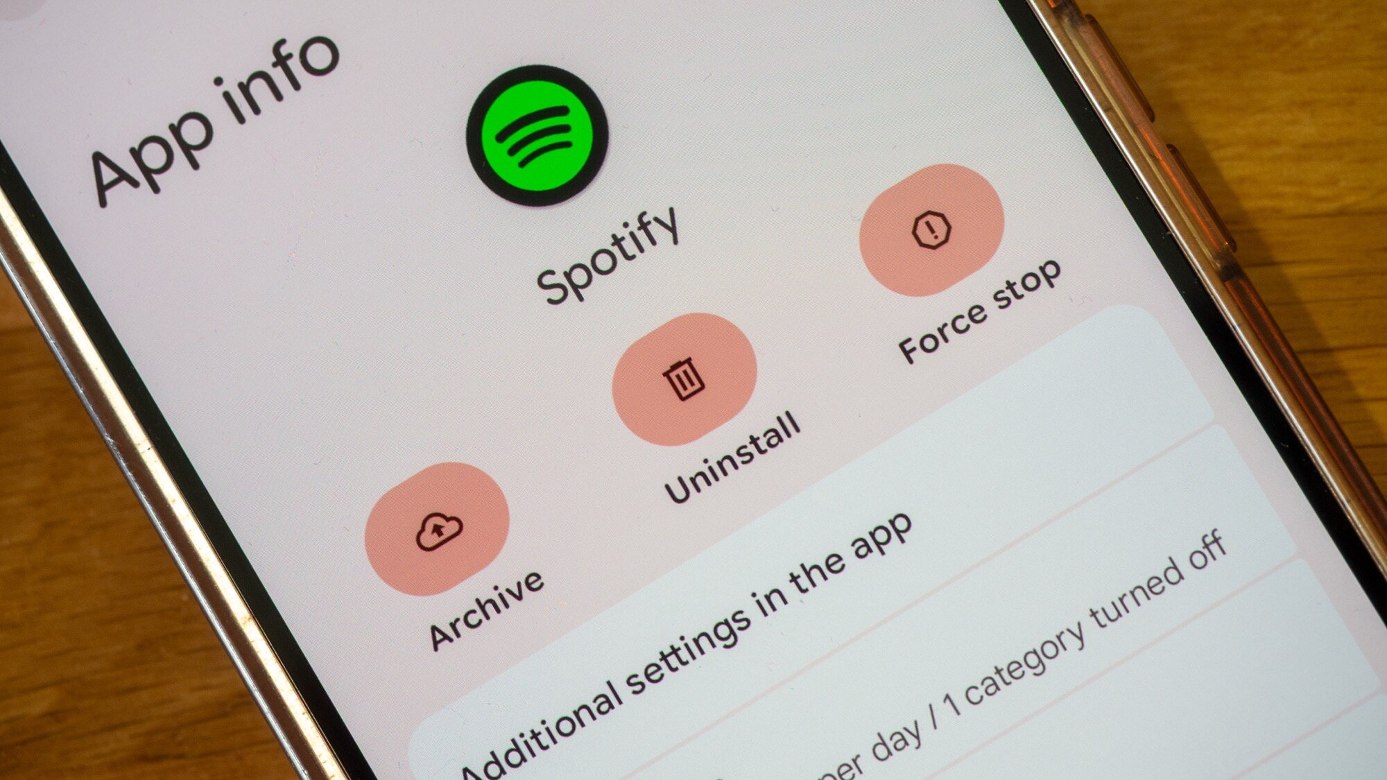 phone showing android app archiving and uninstalling