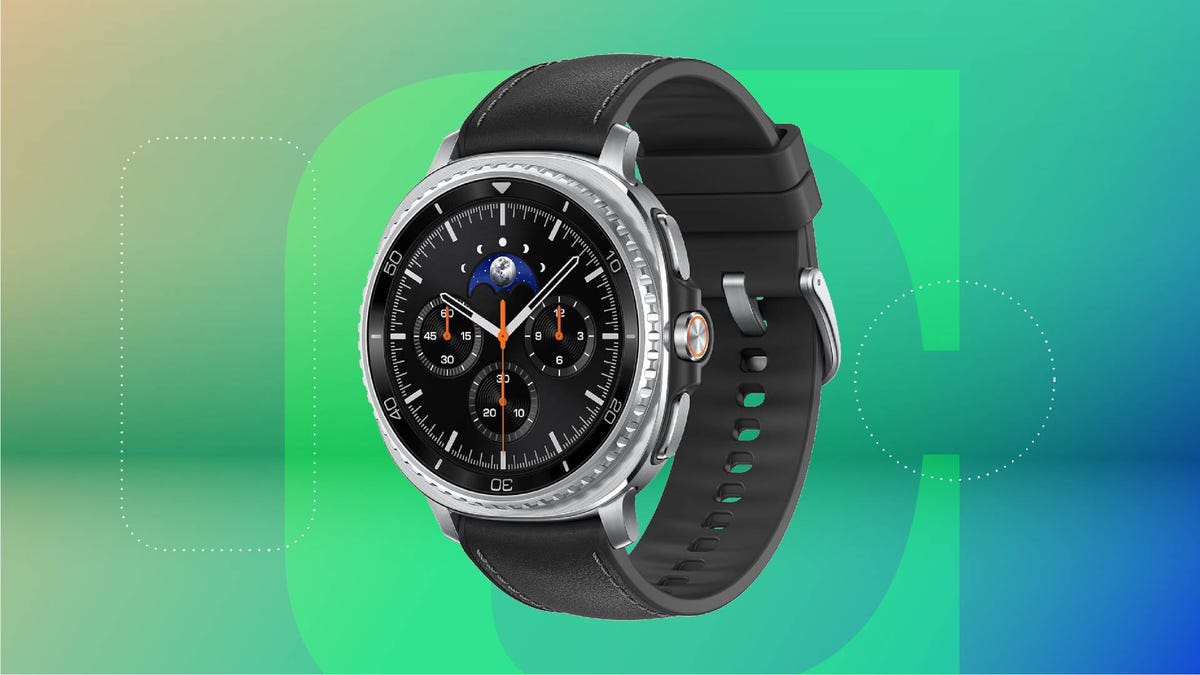 A black and silver smartwatch against a green gradient CNET background.