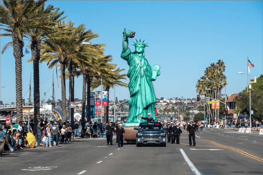 replica of statue of liberty in a parade