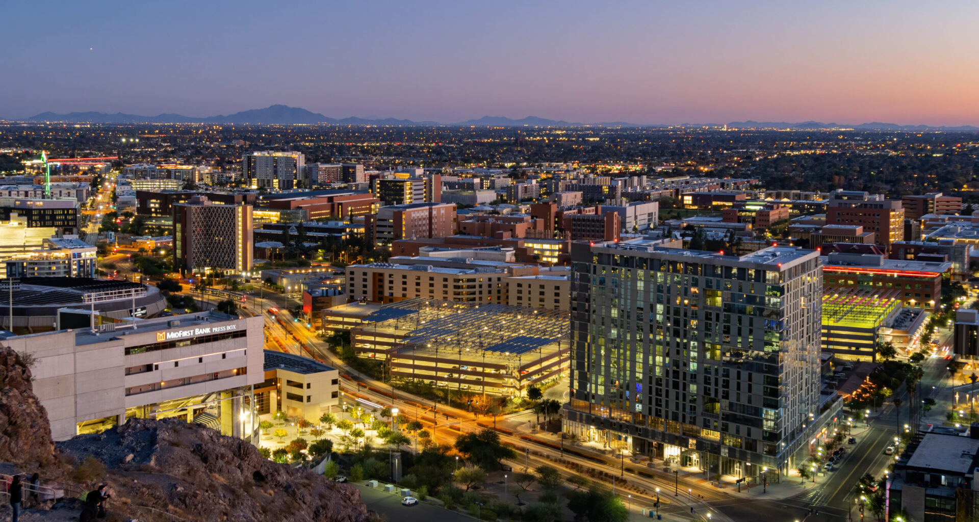Downtown Tempe with the sunset in the background