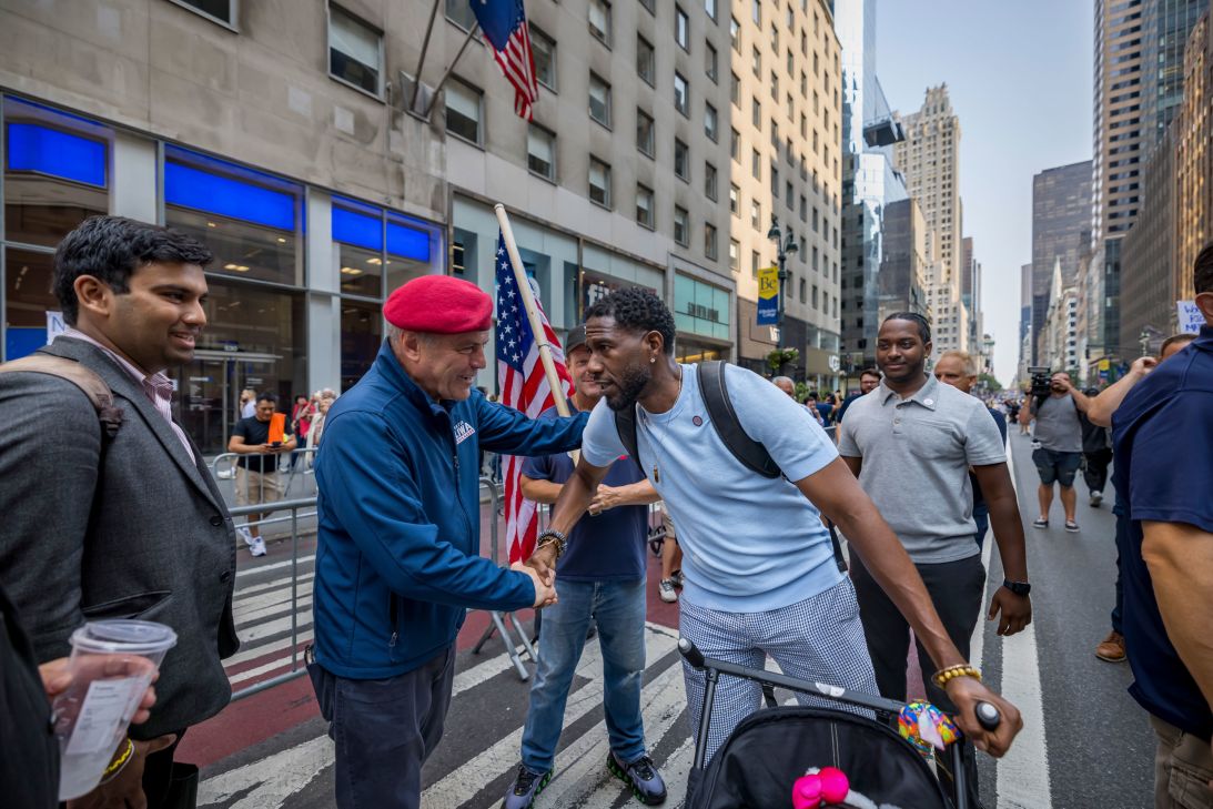 New York City mayoral candidate Curtis Sliwa, left, greets New York City Public Advocate Jumaane Williams as they march in the Labor Day parade.