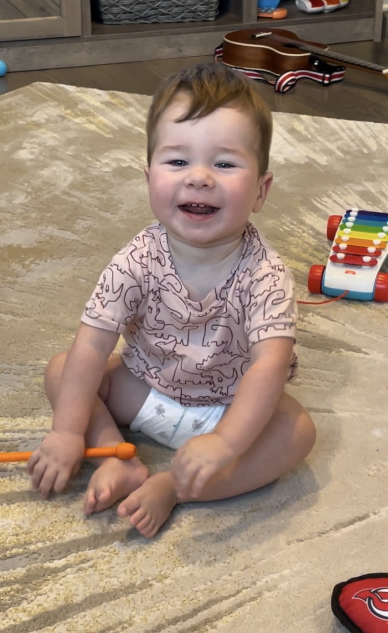 Jack is happy and attentive and tries speaking and making sounds. 