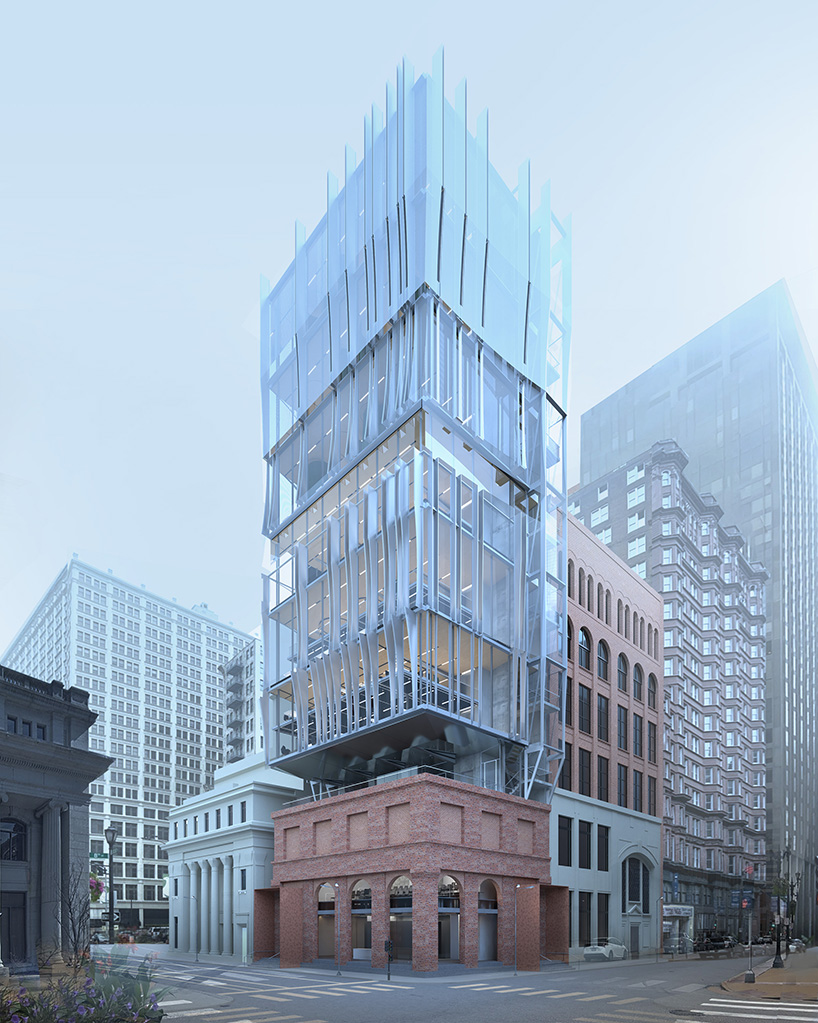 perforated metal panels clad office floating above st. louis's century-old columbia building