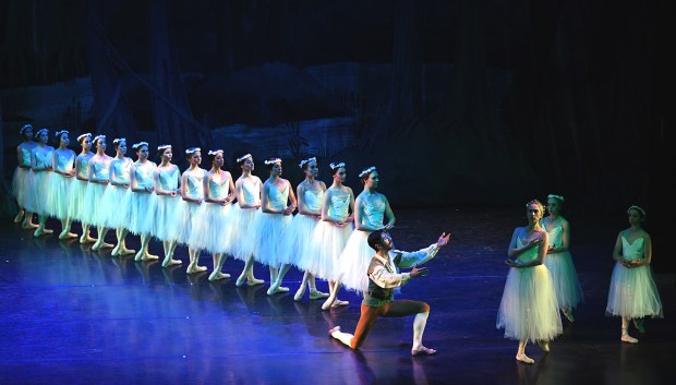 Brian Heil and Megan Jacobs with City Ballet corps in City Ballet of San Diego's "Giselle," playing Oct. 25 and 26 in Escondido. (City Ballet of San Diego)