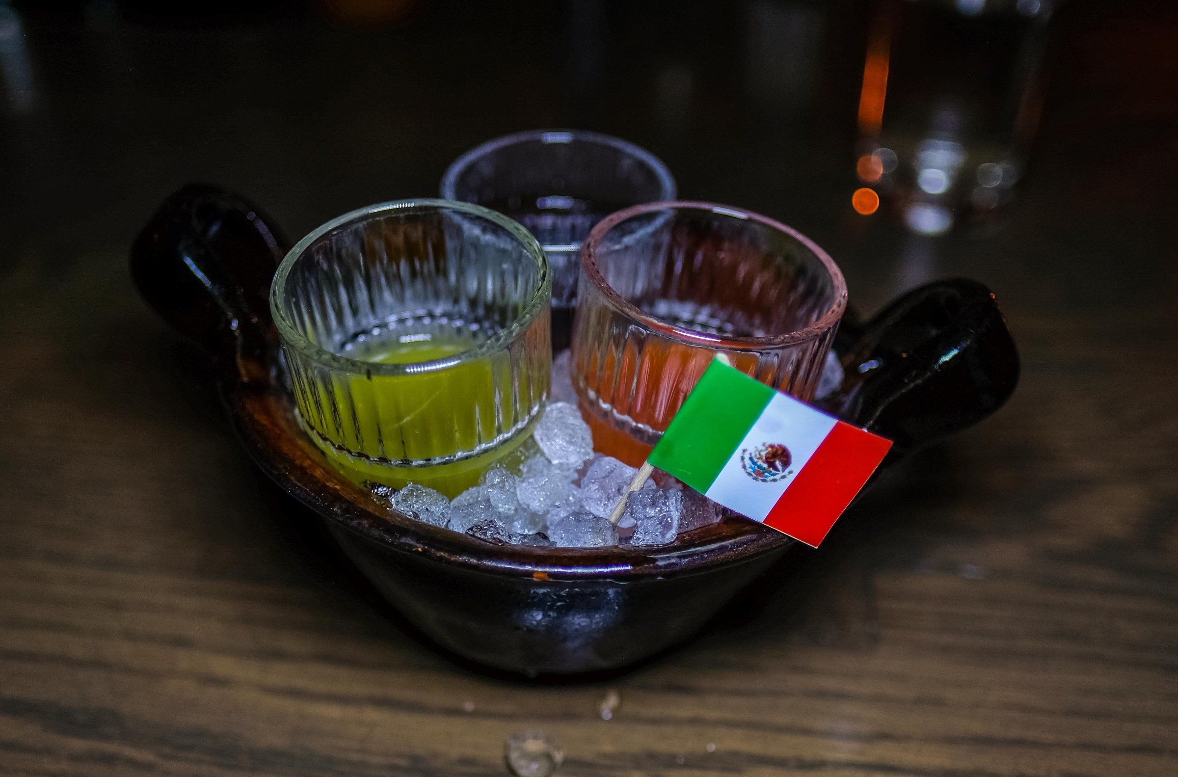 Three short glasses of shots,