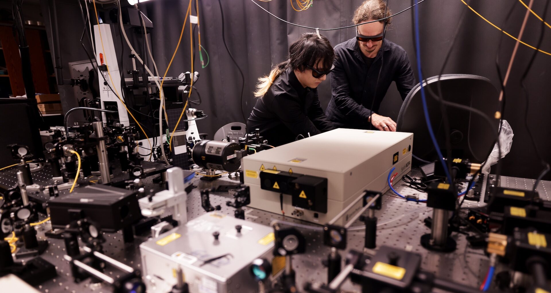 Two people work in an electrical engineering laboratory