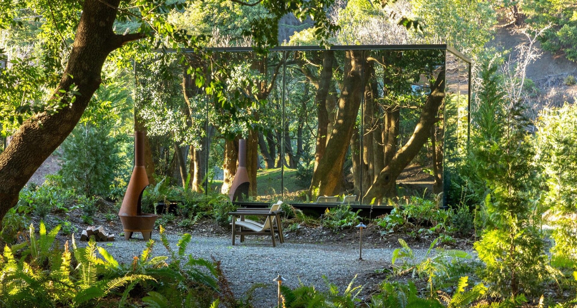 Mirrored cabins by ÖÖD extend Oregon riverside retreat