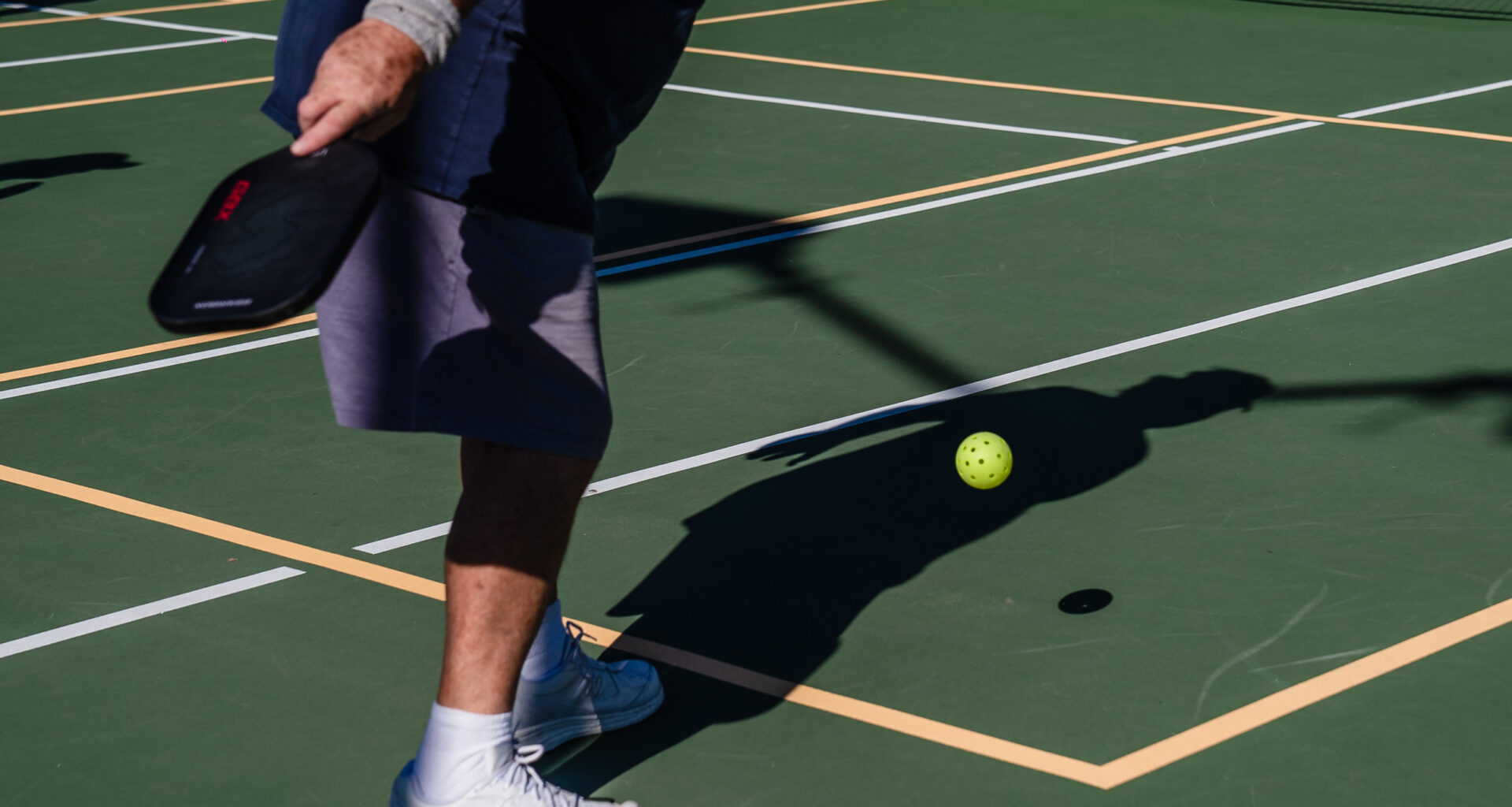 A man plays pickleball at San Diego Pickelball at the Mission Bay Resort On Nov. 28, 2023.