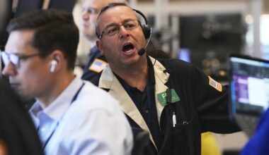Wall Street rises to more records