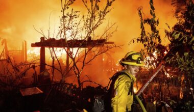 Firefighters work to contain rapidly moving blaze in California gold mining town