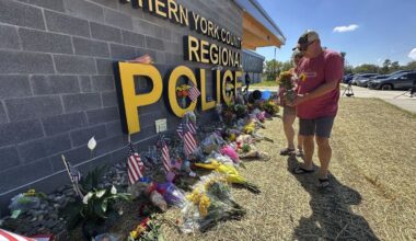 Officers fatally shot in Pennsylvania farm country were hoping to arrest suspected stalker