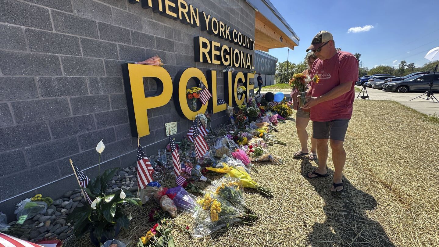 Officers fatally shot in Pennsylvania farm country were hoping to arrest suspected stalker