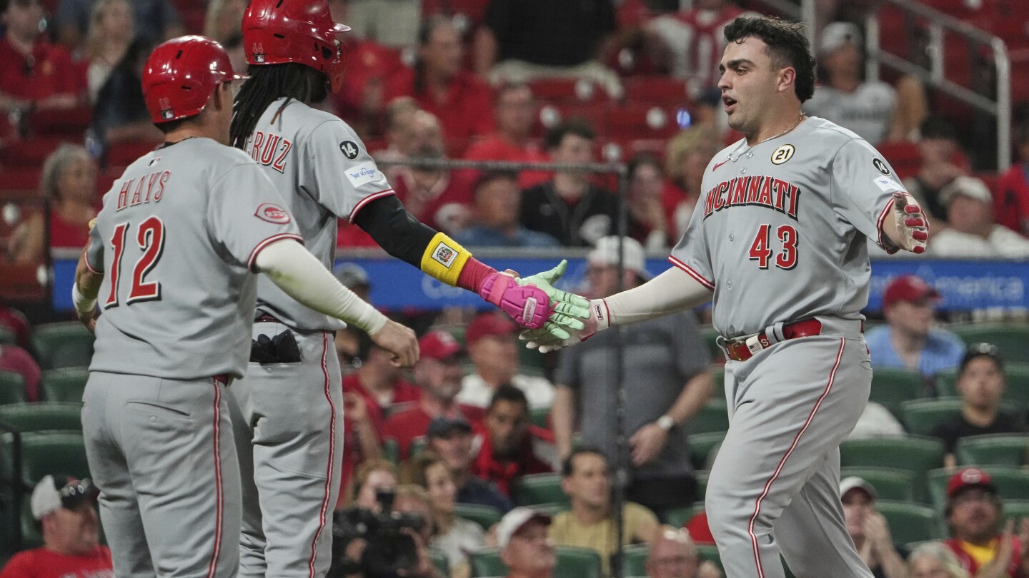 Stephenson hits 3-run double, Reds beat Cardinals 11-6 and close within 2 games of last NL wild card
