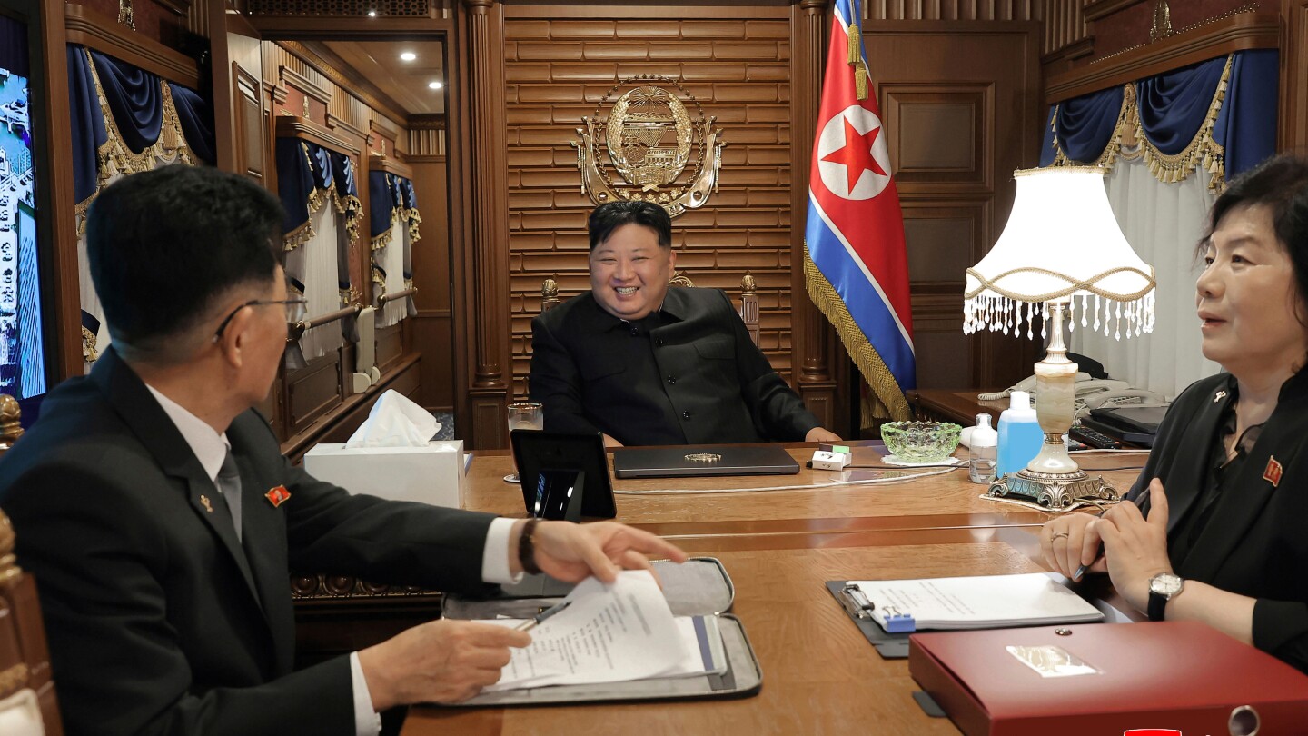 North Korea's Kim travels to Beijing military parade with Russia's Putin and China's Xi Jinping