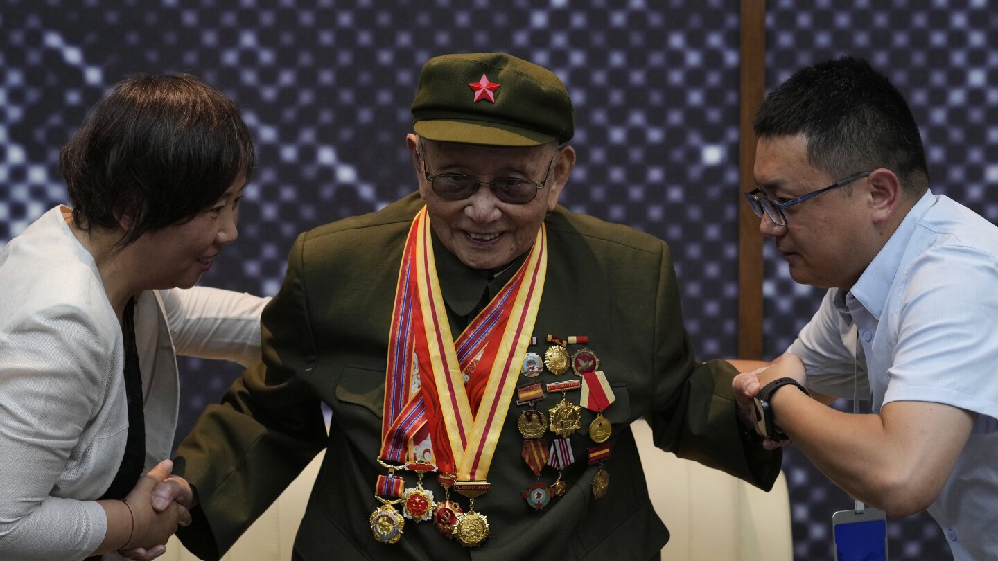 China's military parade aims to instill pride and back Communist Party rule