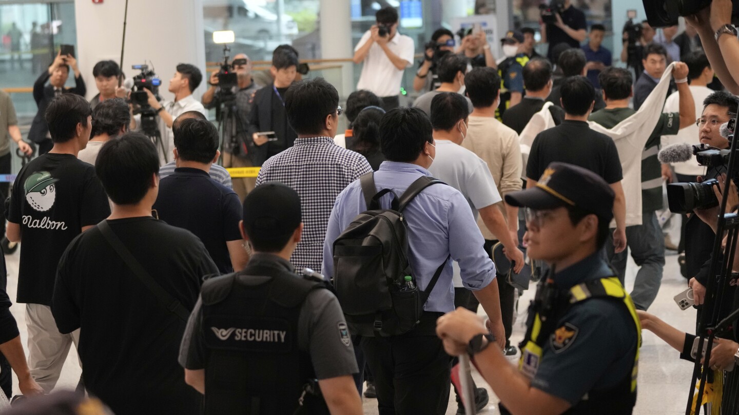 South Korean workers return home after days of detention in Georgia following immigration raid