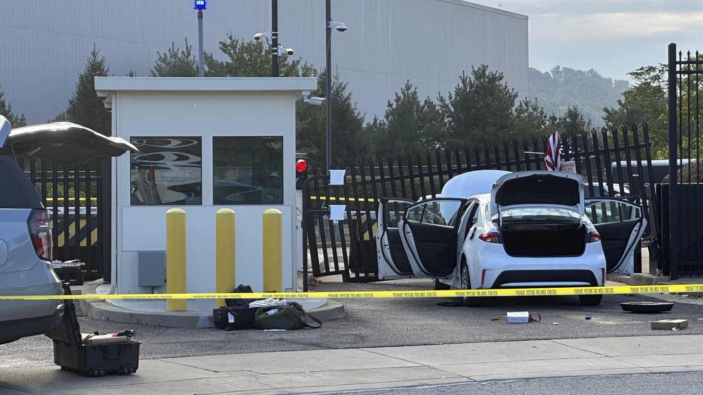 Suspect in custody after driver crashes car into FBI building security gate in Pittsburgh