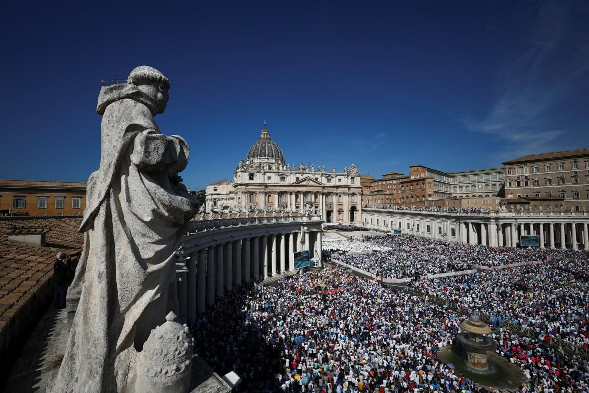 An aerial photo should tens of thousands of people gathered outside the step of the Vatican