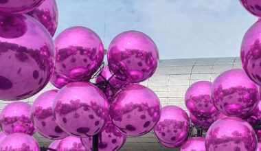 vincent leroy's kinetic cloud sculpture of glossy pink spheres hovers in seoul