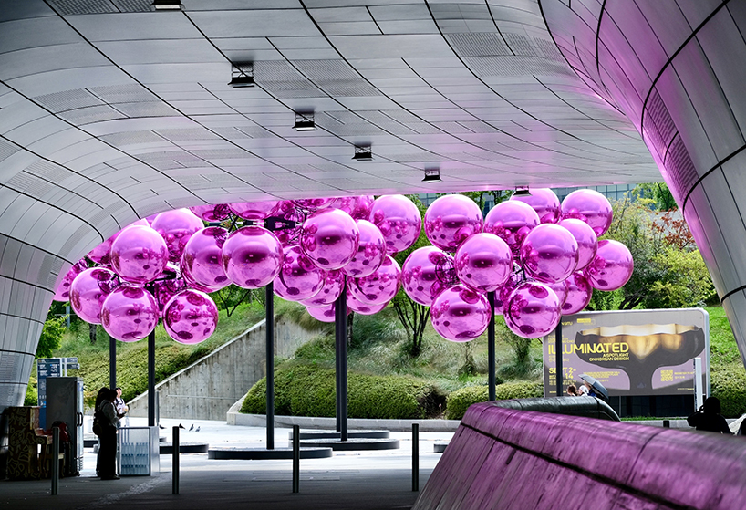 vincent leroy's kinetic cloud sculpture of glossy pink spheres hovers at seoul's design plaza