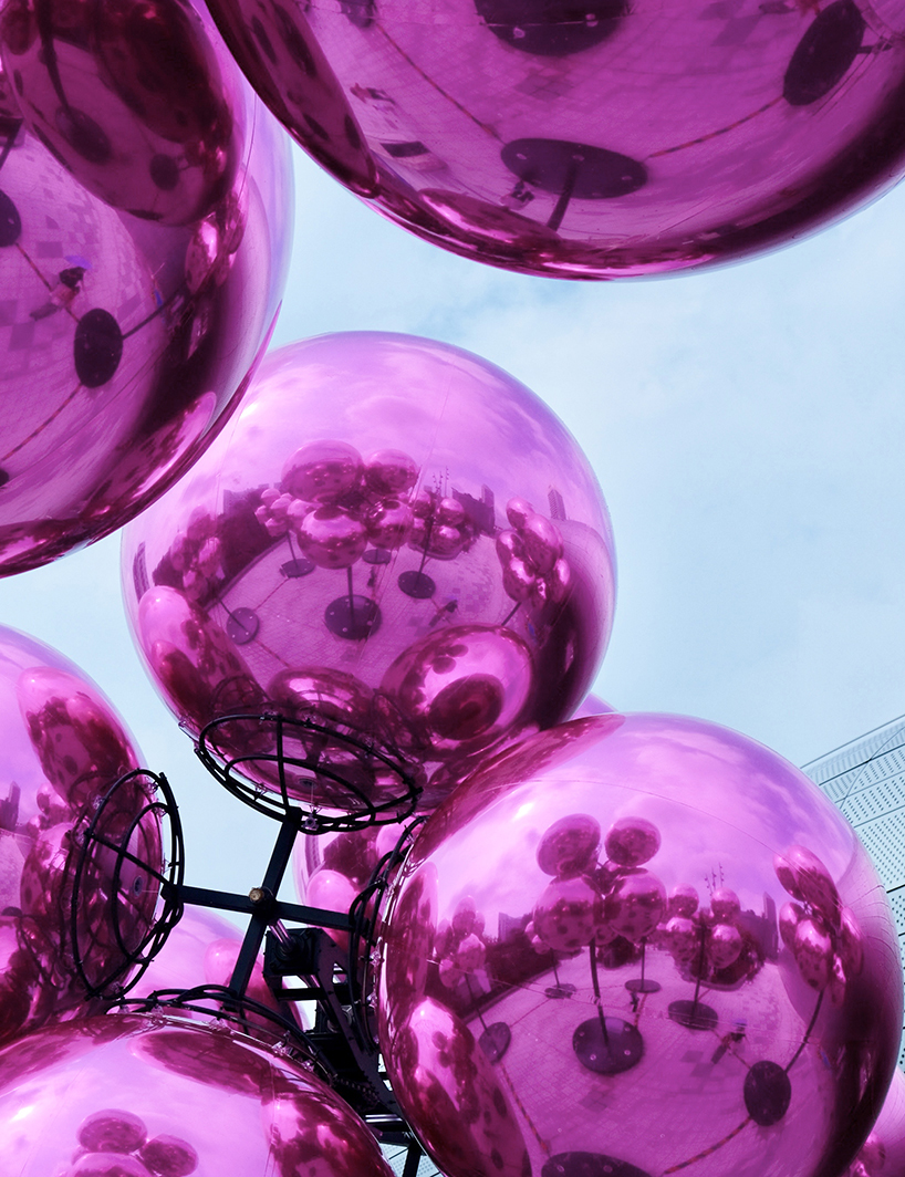 vincent leroy's kinetic cloud sculpture of glossy pink spheres hovers at seoul's design plaza