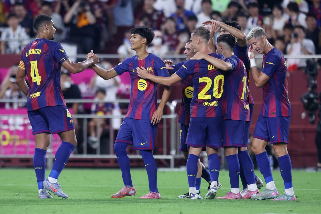 KOBE, JAPAN - JULY 27: FC Barcelona's Pedro Fernandez (C) is congratulated after scoring a gosal during the preseason friendly between Vissel Kobe and FC Barcelona at Noevir Stadium Kobe on July 27, 2025 in Kobe, Hyogo, Japan. (Photo by Paul Miller/Getty Images)