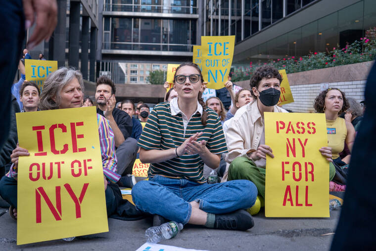 REUTERS/DAVID DEE DELGADO
                                People protest against Immigration and Customs Enforcement (ICE) outside U.S. Immigration Court in Manhattan, New York City.