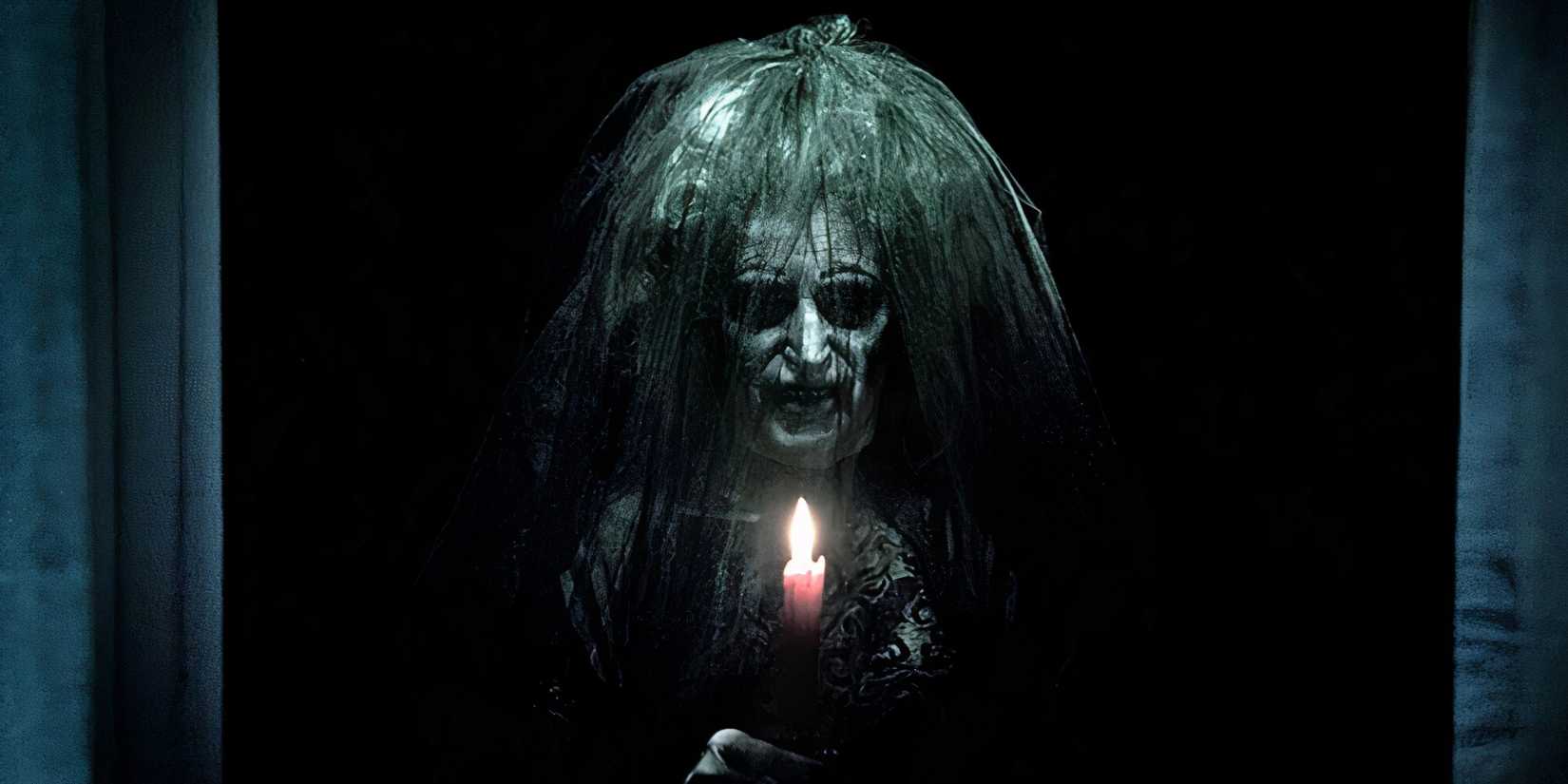 The witch in Insidious is holding a candle