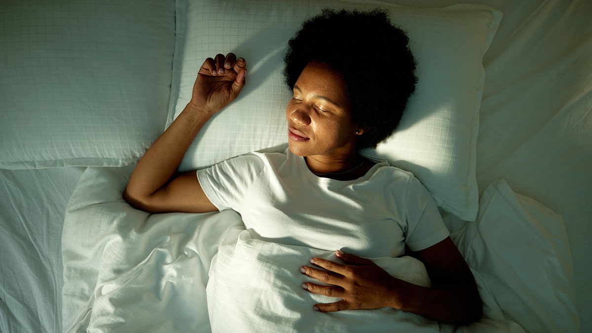 woman sleeping in bed