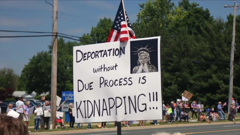 A sign reading “Deportation without Due Process is Kidnapping!” at the “No Kings” protest in Kalamazoo, Michigan on June 14, 2025. (WOODTV)
