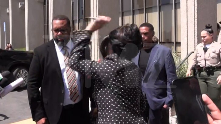 090225_cardi_leaving_court_pen_kal