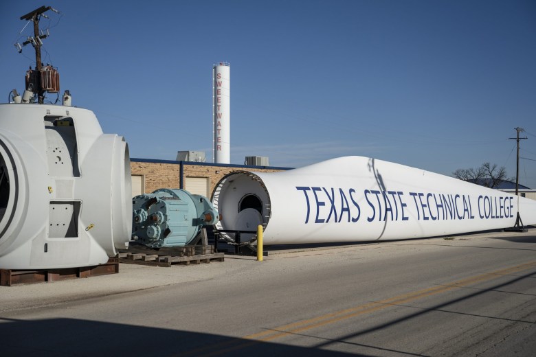 Wind Turbine components decorate the exterior of the Texas State Technical College’s Wind Energy Technology building in Sweetwater on March 5, 2024.