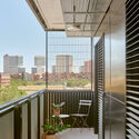 45 Industrialized Social Housing Units  / Vivas Arquitectos - Interior Photography, Glass, Balcony