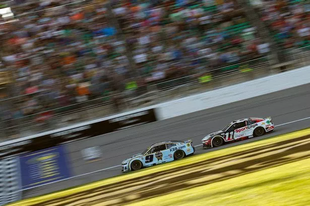 Denny Hamlin races Chase Elliott at Kansas