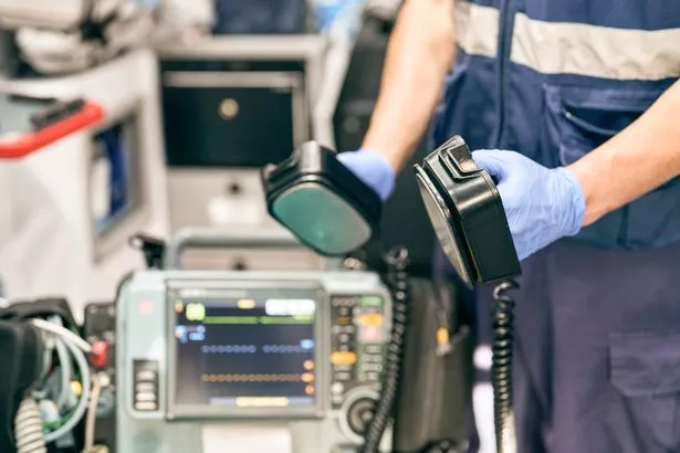 Medics trying to restart a patient's heart