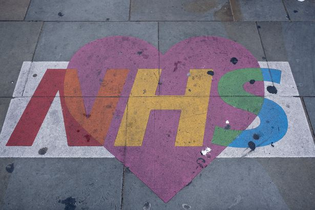 NHS sign on floor