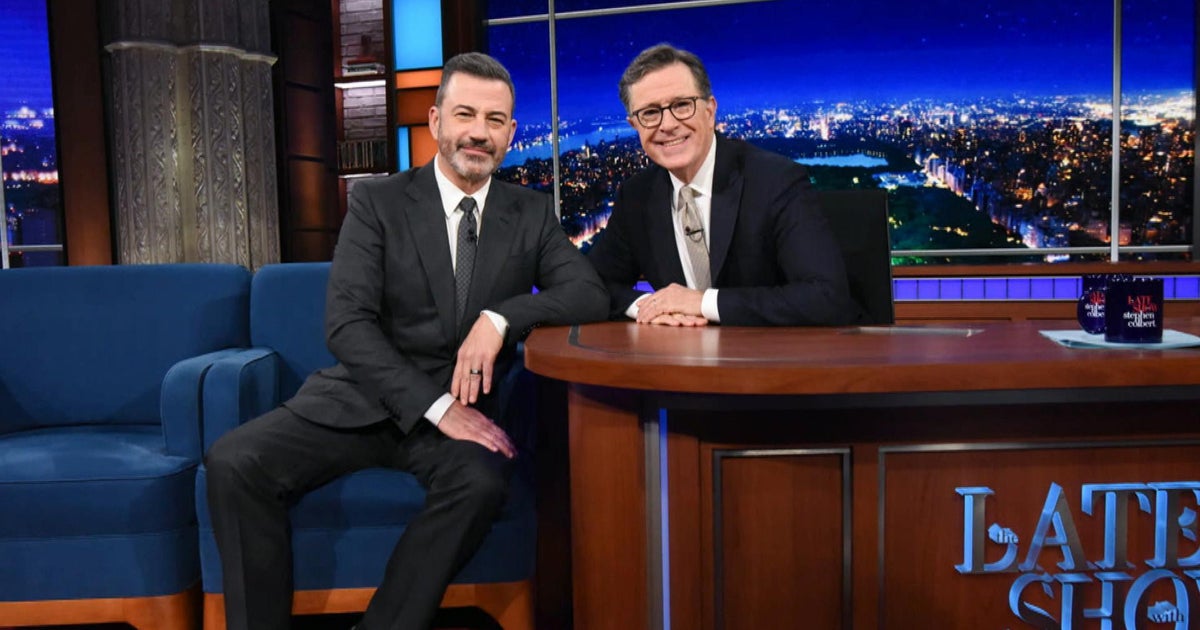 Late-night hosts Colbert, Kimmel appear as guests on each other's shows