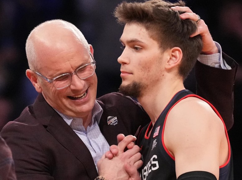 UConn basketball coach Dan Hurley congratulates Aidan Mahaney during a timeout for his play in the Huskies’ comeback victory over Villanova in a quarterfinal game of last year’s Big East Conference Tournament.