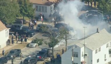Federal agents fire tear gas during standoff with crowd in East Side, Chicago, after car crash